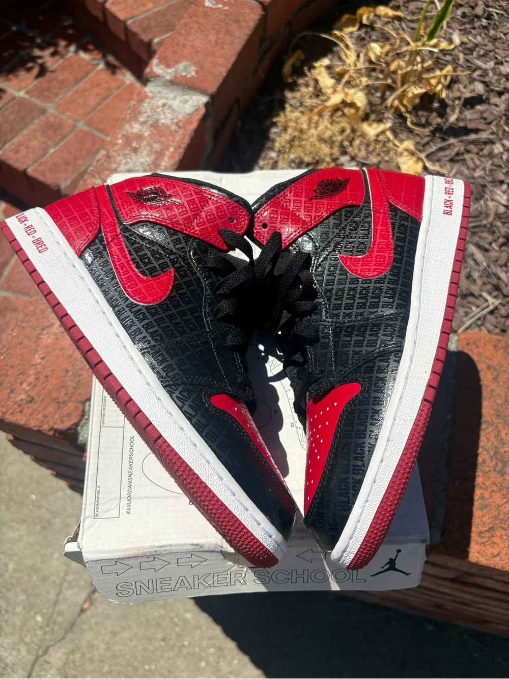 Jordan Retro 1 Mid Kids Black and Red Sneakers